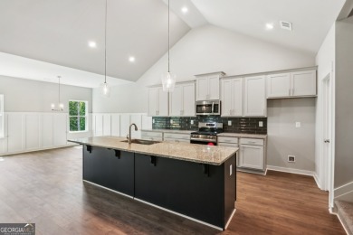 Welcome home to a beautifully crafted new construction home by a on Traditions of Braselton Golf Club in Georgia - for sale on GolfHomes.com, golf home, golf lot