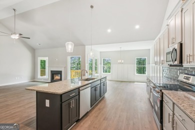 Welcome home to a beautifully crafted new construction home by a on Traditions of Braselton Golf Club in Georgia - for sale on GolfHomes.com, golf home, golf lot
