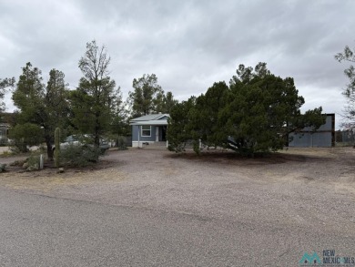 Exceptional 3-Bedroom, 2-Bath Manufactured Home on Prime Corner on Sierra Del Rio Golf Club in New Mexico - for sale on GolfHomes.com, golf home, golf lot