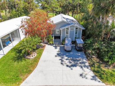 This beautiful and spacious park home has amazing views of the on The Great Outdoors Golf and Country Club in Florida - for sale on GolfHomes.com, golf home, golf lot