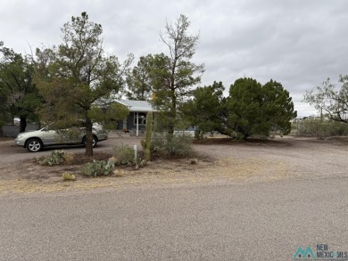 Exceptional 3-Bedroom, 2-Bath Manufactured Home on Prime Corner on Sierra Del Rio Golf Club in New Mexico - for sale on GolfHomes.com, golf home, golf lot