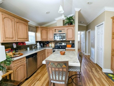 This beautiful and spacious park home has amazing views of the on The Great Outdoors Golf and Country Club in Florida - for sale on GolfHomes.com, golf home, golf lot