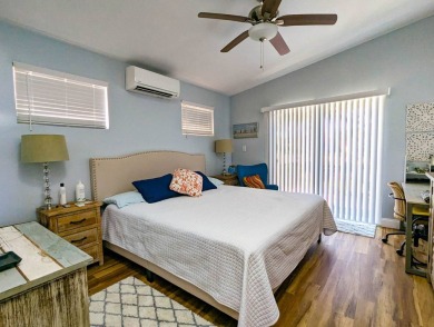 This beautiful and spacious park home has amazing views of the on The Great Outdoors Golf and Country Club in Florida - for sale on GolfHomes.com, golf home, golf lot