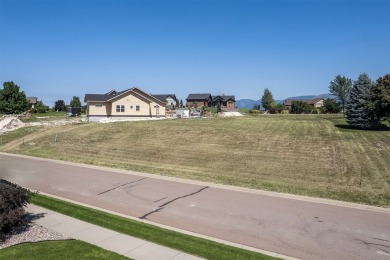 Elevated .463-acre lot in Mission Bay Village Phase 2, located on Polson Bay Golf Course - Championship Course in Montana - for sale on GolfHomes.com, golf home, golf lot