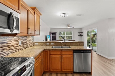 Welcome to refined living in the heart of Sienna Greens.
This on Inverrary Country Club in Florida - for sale on GolfHomes.com, golf home, golf lot