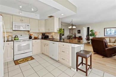 Welcome to a home with a happy atmosphere and abundant sunshine! on Isla Del Sol Yacht and Country Club in Florida - for sale on GolfHomes.com, golf home, golf lot