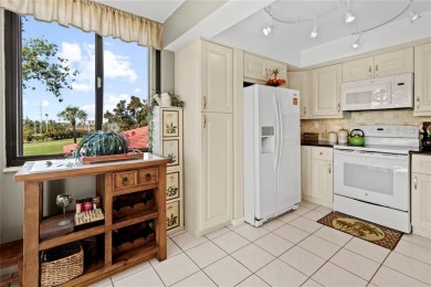 Welcome to a home with a happy atmosphere and abundant sunshine! on Isla Del Sol Yacht and Country Club in Florida - for sale on GolfHomes.com, golf home, golf lot
