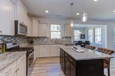 Lovingly maintained by original owners, this custom transitional on Olde Liberty Golf and Country Club in North Carolina - for sale on GolfHomes.com, golf home, golf lot