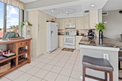 Welcome to a home with a happy atmosphere and abundant sunshine! on Isla Del Sol Yacht and Country Club in Florida - for sale on GolfHomes.com, golf home, golf lot