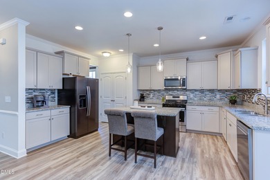 Lovingly maintained by original owners, this custom transitional on Olde Liberty Golf and Country Club in North Carolina - for sale on GolfHomes.com, golf home, golf lot