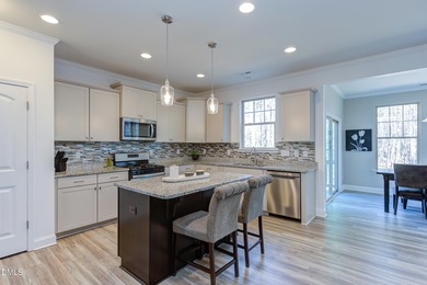 Lovingly maintained by original owners, this custom transitional on Olde Liberty Golf and Country Club in North Carolina - for sale on GolfHomes.com, golf home, golf lot