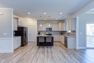 Lovingly maintained by original owners, this custom transitional on Olde Liberty Golf and Country Club in North Carolina - for sale on GolfHomes.com, golf home, golf lot