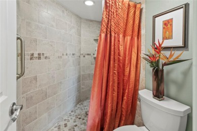 Welcome to a home with a happy atmosphere and abundant sunshine! on Isla Del Sol Yacht and Country Club in Florida - for sale on GolfHomes.com, golf home, golf lot