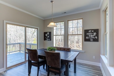 Lovingly maintained by original owners, this custom transitional on Olde Liberty Golf and Country Club in North Carolina - for sale on GolfHomes.com, golf home, golf lot