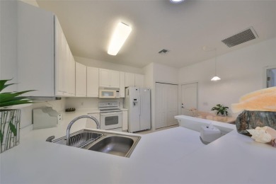 Experience the epitome of maintenance-free living in this on Scepter Golf Club in Florida - for sale on GolfHomes.com, golf home, golf lot