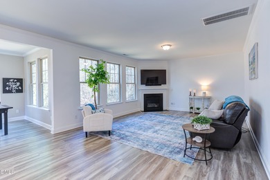 Lovingly maintained by original owners, this custom transitional on Olde Liberty Golf and Country Club in North Carolina - for sale on GolfHomes.com, golf home, golf lot