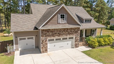 3 car garage, nearly 1 acre lot, screened porch and primary on Bluff Golf Links in North Carolina - for sale on GolfHomes.com, golf home, golf lot