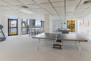 Welcome to a home with a happy atmosphere and abundant sunshine! on Isla Del Sol Yacht and Country Club in Florida - for sale on GolfHomes.com, golf home, golf lot
