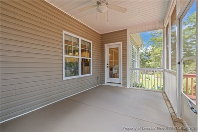 3 car garage, nearly 1 acre lot, screened porch and primary on Bluff Golf Links in North Carolina - for sale on GolfHomes.com, golf home, golf lot