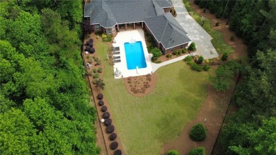 Gorgeous four-sided brick home on a level, private cul-de-sac on Eagles Landing Country Club in Georgia - for sale on GolfHomes.com, golf home, golf lot
