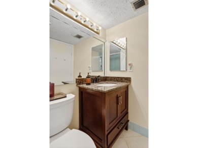 YOUR SHIP HAS COME IN. IMMACULATE MOVE IN CONDITION FIRST FLOOR on  in Florida - for sale on GolfHomes.com, golf home, golf lot