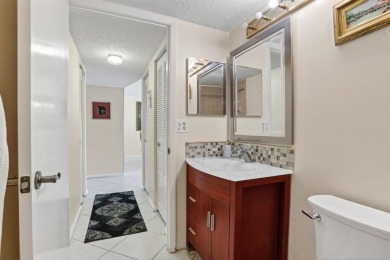 YOUR SHIP HAS COME IN. IMMACULATE MOVE IN CONDITION FIRST FLOOR on  in Florida - for sale on GolfHomes.com, golf home, golf lot