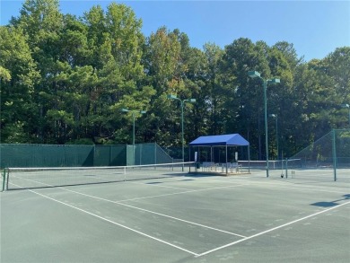 Gorgeous four-sided brick home on a level, private cul-de-sac on Eagles Landing Country Club in Georgia - for sale on GolfHomes.com, golf home, golf lot