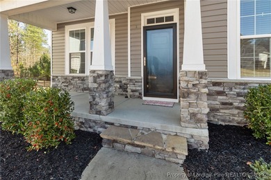 Welcome to this beautiful 4-bedroom, 3-bath home with an office on Anderson Creek Golf Club in North Carolina - for sale on GolfHomes.com, golf home, golf lot