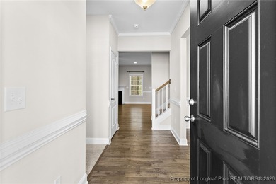 Welcome to this beautiful 4-bedroom, 3-bath home with an office on Anderson Creek Golf Club in North Carolina - for sale on GolfHomes.com, golf home, golf lot