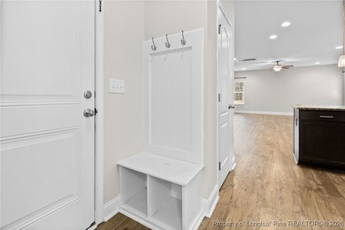 Welcome to this beautiful 4-bedroom, 3-bath home with an office on Anderson Creek Golf Club in North Carolina - for sale on GolfHomes.com, golf home, golf lot