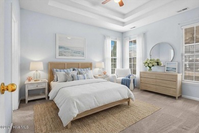 Welcome to 501 Sandpiper Bay SW, a beautifully maintained on Sandpiper Bay Golf and Country Club in North Carolina - for sale on GolfHomes.com, golf home, golf lot