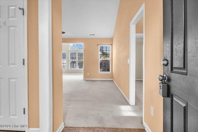 Welcome to 501 Sandpiper Bay SW, a beautifully maintained on Sandpiper Bay Golf and Country Club in North Carolina - for sale on GolfHomes.com, golf home, golf lot