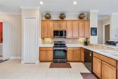 OPERETTA MODEL WITH EXPANSIVE WATER & GOLF COURSE VIEWS! Located on Poinciana Golf Club in Florida - for sale on GolfHomes.com, golf home, golf lot