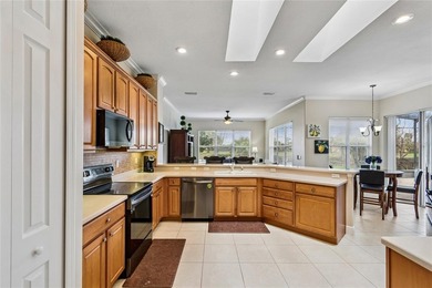 OPERETTA MODEL WITH EXPANSIVE WATER & GOLF COURSE VIEWS! Located on Poinciana Golf Club in Florida - for sale on GolfHomes.com, golf home, golf lot