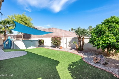 This stunning golf course area home is tucked in a quiet on London Bridge Golf Course in Arizona - for sale on GolfHomes.com, golf home, golf lot