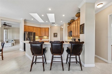 OPERETTA MODEL WITH EXPANSIVE WATER & GOLF COURSE VIEWS! Located on Poinciana Golf Club in Florida - for sale on GolfHomes.com, golf home, golf lot