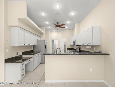 Located in Glen Lakes, this Addison built maintained home is on Glen Lakes Country Club in Florida - for sale on GolfHomes.com, golf home, golf lot