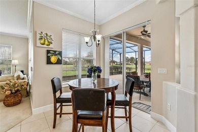 OPERETTA MODEL WITH EXPANSIVE WATER & GOLF COURSE VIEWS! Located on Poinciana Golf Club in Florida - for sale on GolfHomes.com, golf home, golf lot