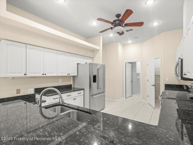 Located in Glen Lakes, this Addison built maintained home is on Glen Lakes Country Club in Florida - for sale on GolfHomes.com, golf home, golf lot