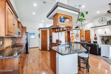 This stunning golf course area home is tucked in a quiet on London Bridge Golf Course in Arizona - for sale on GolfHomes.com, golf home, golf lot