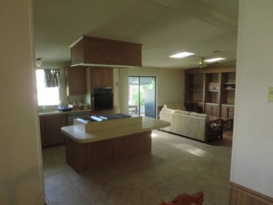 Very spacious home with natural light flowing in from all sides on Whisperwood Golf Course in Florida - for sale on GolfHomes.com, golf home, golf lot