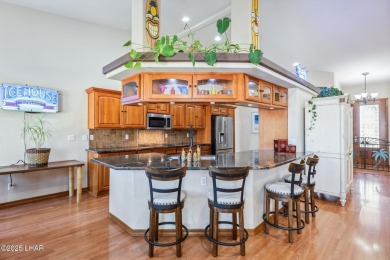 This stunning golf course area home is tucked in a quiet on London Bridge Golf Course in Arizona - for sale on GolfHomes.com, golf home, golf lot