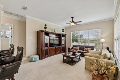 OPERETTA MODEL WITH EXPANSIVE WATER & GOLF COURSE VIEWS! Located on Poinciana Golf Club in Florida - for sale on GolfHomes.com, golf home, golf lot
