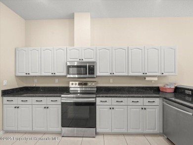 Located in Glen Lakes, this Addison built maintained home is on Glen Lakes Country Club in Florida - for sale on GolfHomes.com, golf home, golf lot