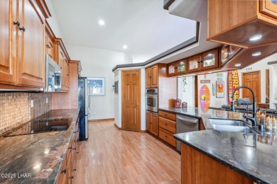This stunning golf course area home is tucked in a quiet on London Bridge Golf Course in Arizona - for sale on GolfHomes.com, golf home, golf lot