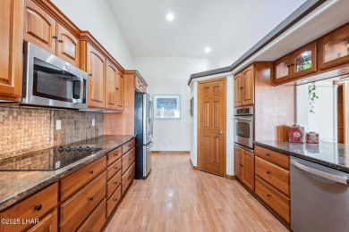 This stunning golf course area home is tucked in a quiet on London Bridge Golf Course in Arizona - for sale on GolfHomes.com, golf home, golf lot