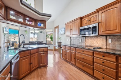 This stunning golf course area home is tucked in a quiet on London Bridge Golf Course in Arizona - for sale on GolfHomes.com, golf home, golf lot