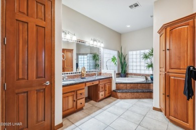 This stunning golf course area home is tucked in a quiet on London Bridge Golf Course in Arizona - for sale on GolfHomes.com, golf home, golf lot