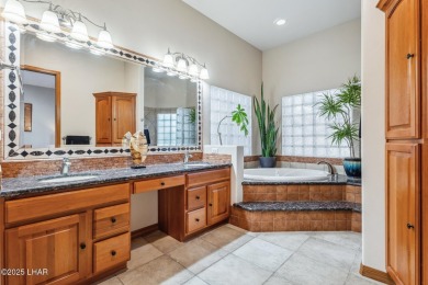 This stunning golf course area home is tucked in a quiet on London Bridge Golf Course in Arizona - for sale on GolfHomes.com, golf home, golf lot