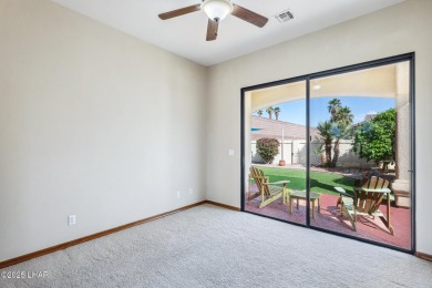 This stunning golf course area home is tucked in a quiet on London Bridge Golf Course in Arizona - for sale on GolfHomes.com, golf home, golf lot
